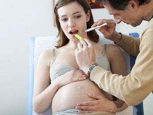 Mọc răng khôn khi mang thai có nhổ được không?
